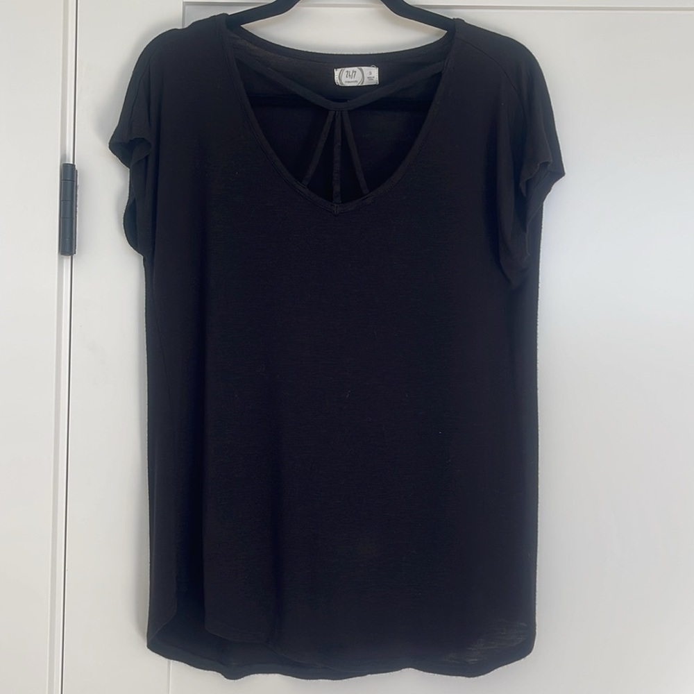 Maurice’s black cap sleeve tee with cutout v-neck